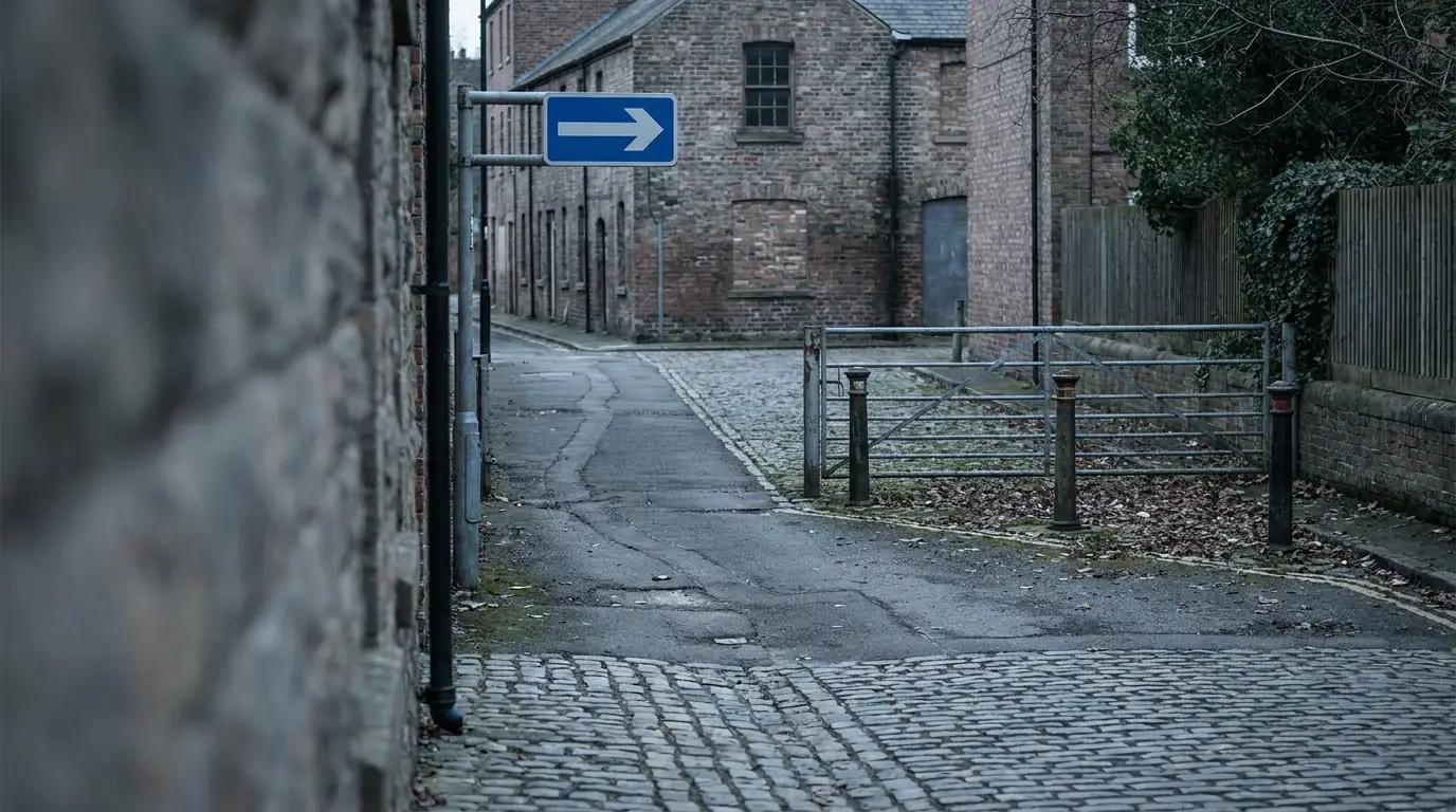 Ein Einbahnstraßen-Schild an einem Zahlungsweg, der nur in eine Richtung führt